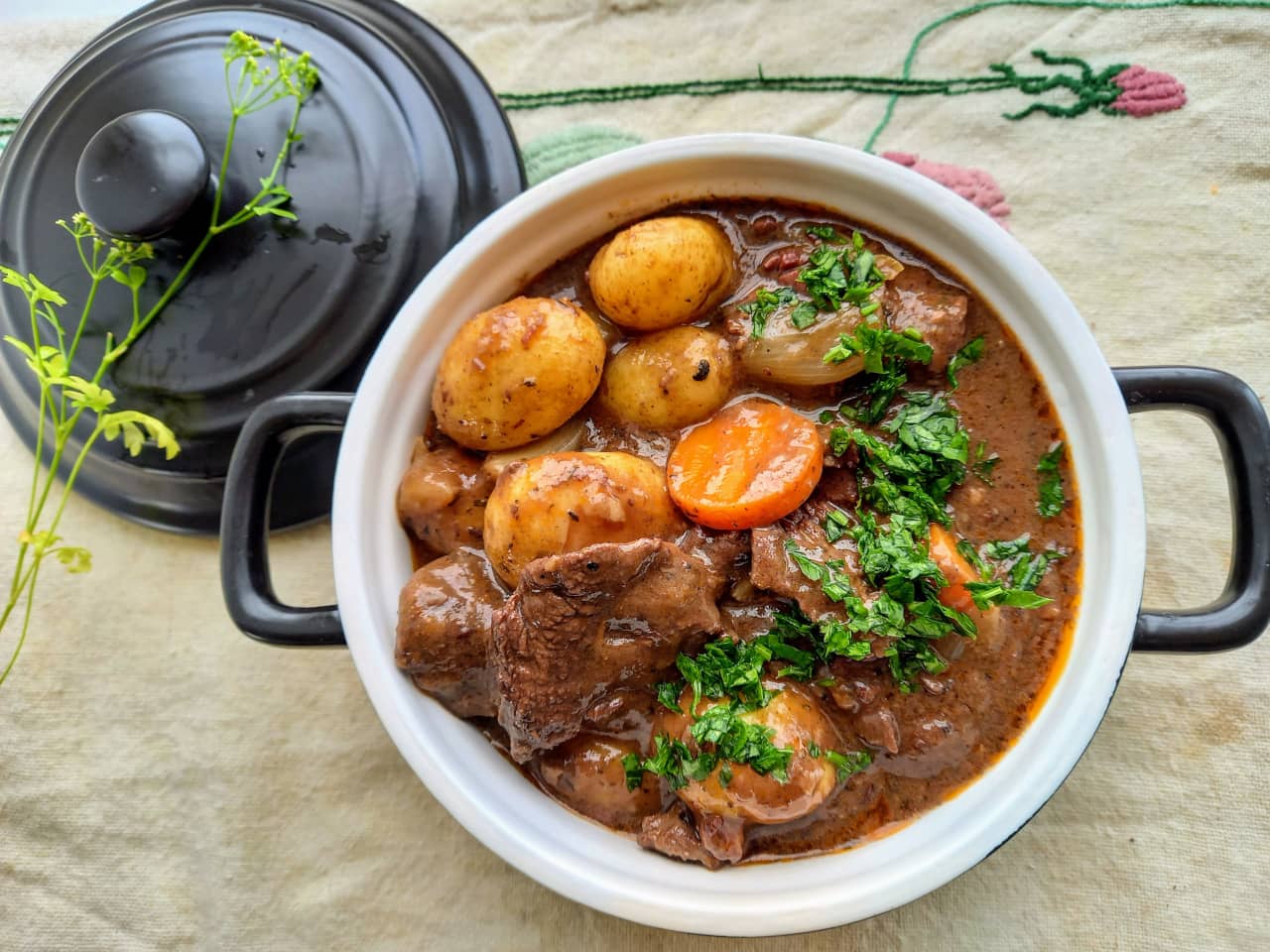 Beef Bourguignon Stew over an embroidered mantelpiece