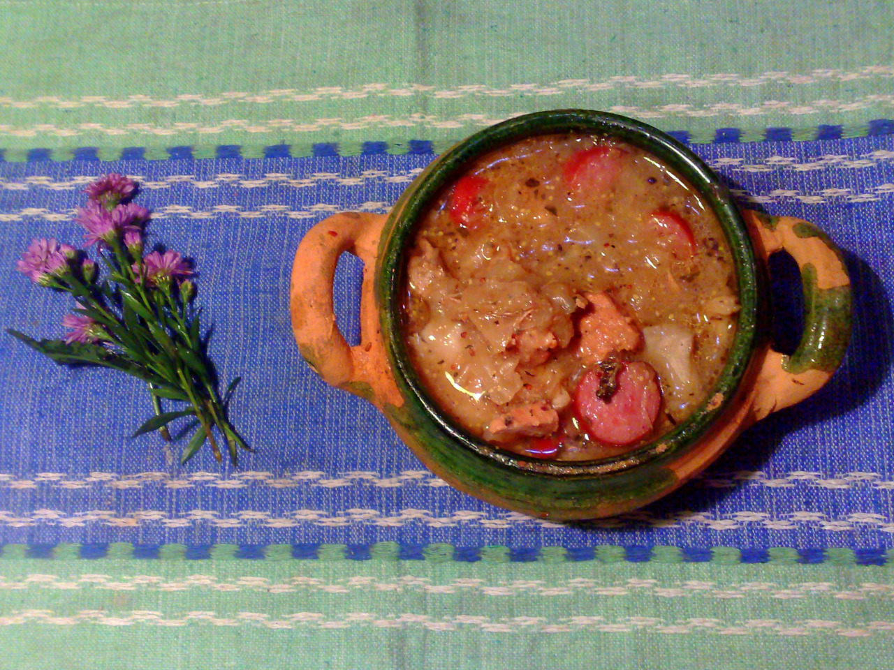 Polish Bigos in a erthenware glazed bowl.