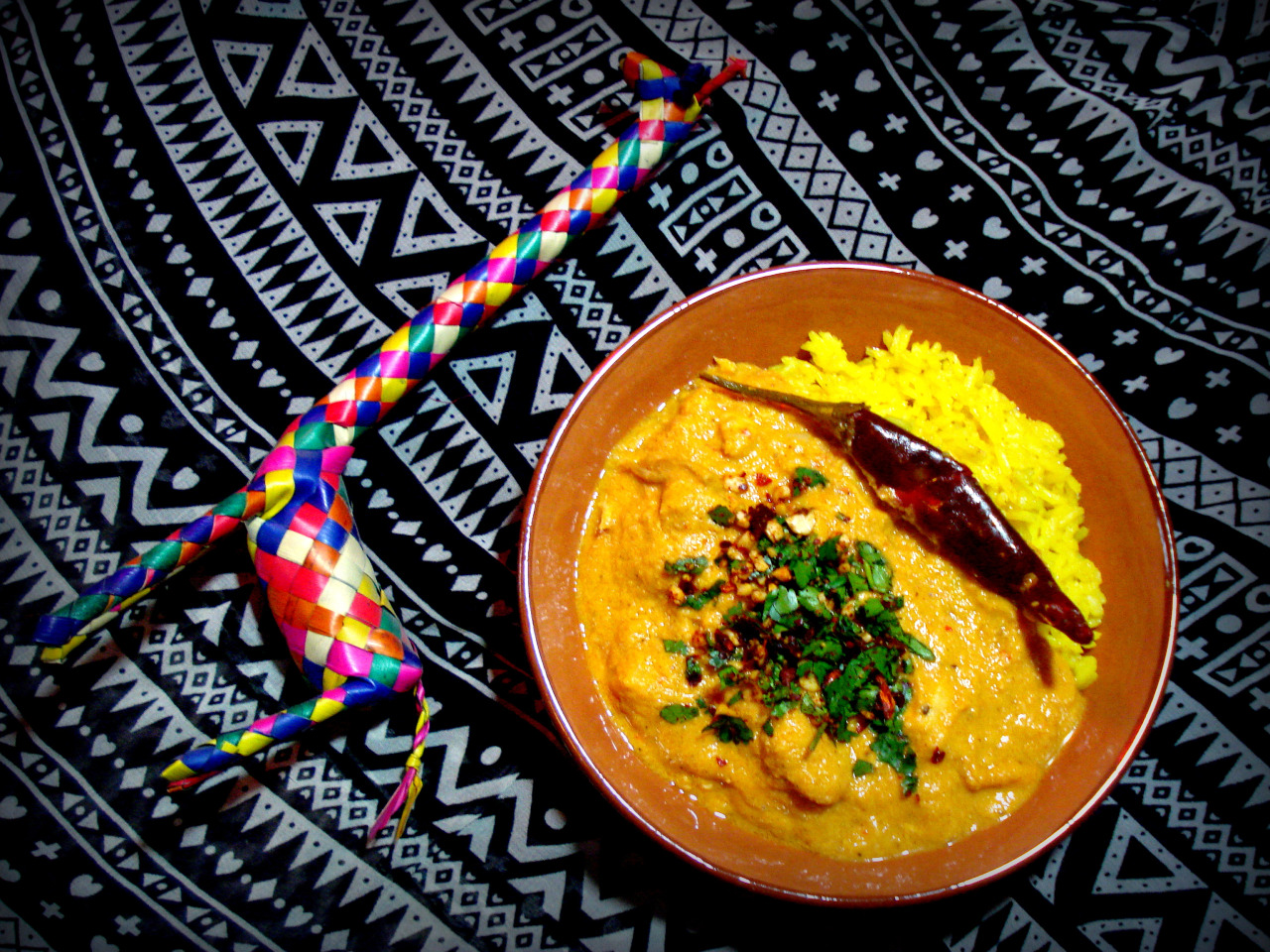 A bowl of delicious West African Chicken Maafe.